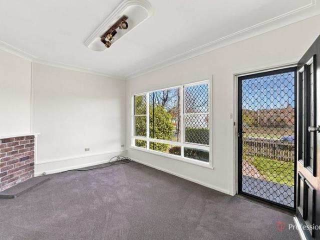 Freshly Updated Family Home with Secure Yard & Entertaining Area