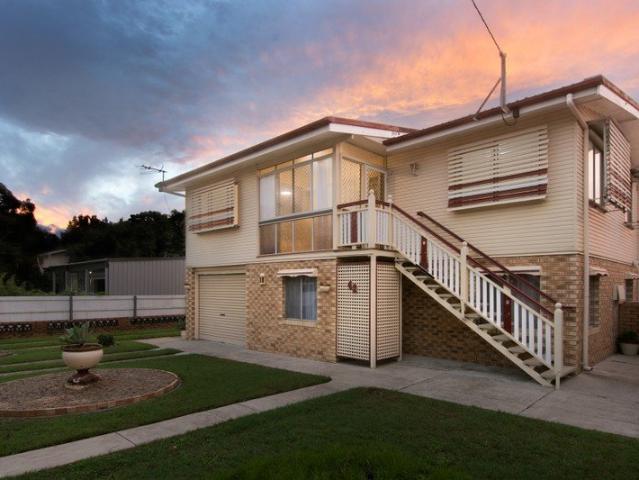 Freshly Updated Family Starter with Side Access & Shed