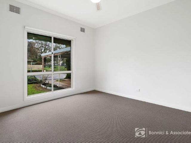 FRESHLY UPDATED HOME WITH SOLAR AND SPACIOUS BACKYARD