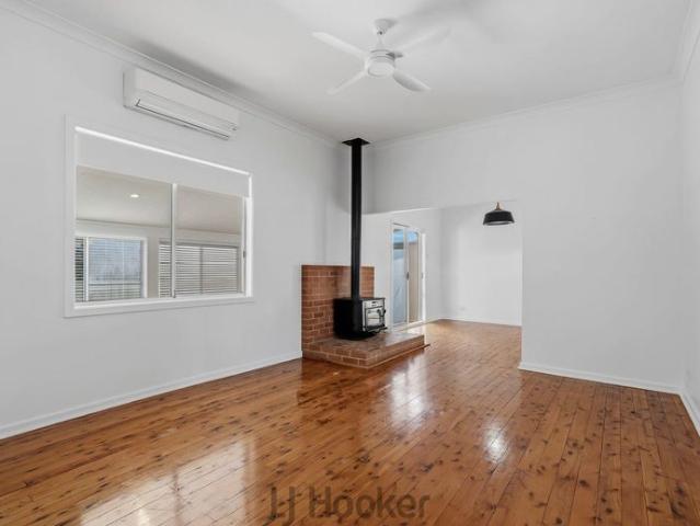 FRESHLY UPDATED HOME IN SOUGHT AFTER LOCATION!