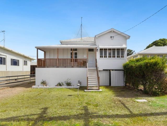 Freshly Updated Highset Home with Rear Lane Access