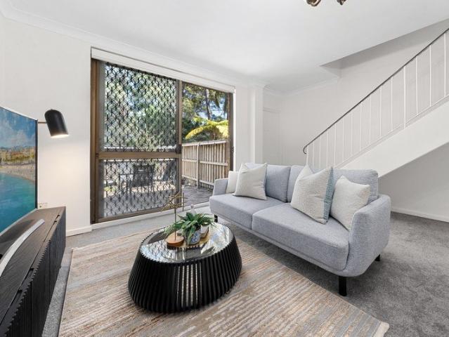 Freshly Updated North Facing Townhouse with Sunlit Entertaining Spaces