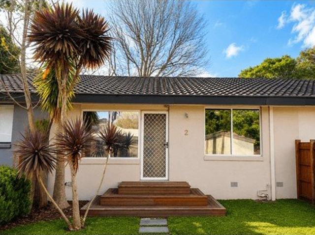 Freshly Updated Single Level Living with a Spacious Courtyard