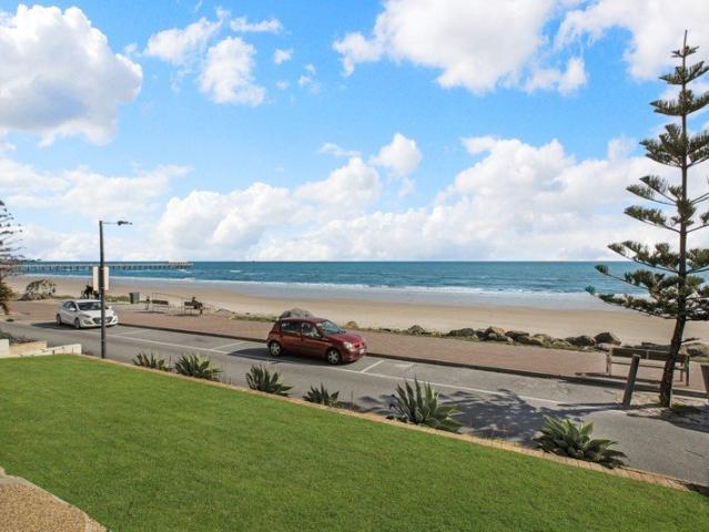 Freshly Updated & Perfectly Positioned by the Beach
