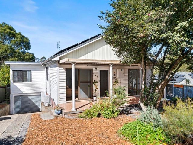 Freshly Updated with large backyard and a Green Outlook