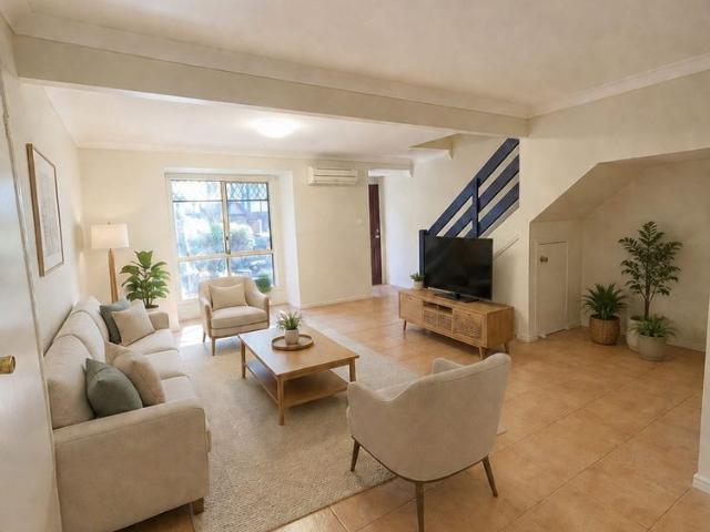 FRESHLY UPDATED TOWNHOUSE IN A CONVENIENT LOCATION