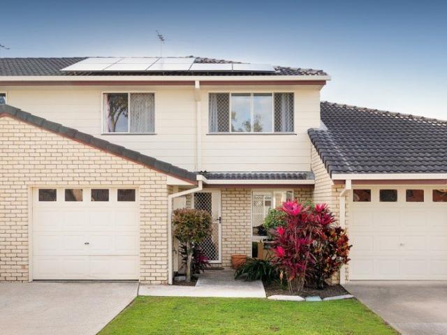 Freshly Updated Townhouse In A Secure Resort Style Community With Outstanding Lifestyle Facilities!