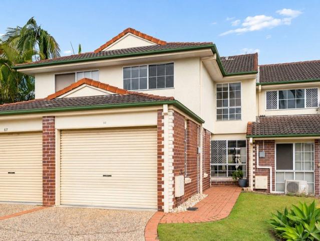 Freshly Updated Townhouse in Secure Gated Complex with Two Swimming Pools!