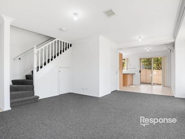 Freshly Updated Three Bedroom Townhouse in Convenient Location