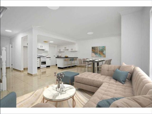Freshly Updated Three Bedroom Townhouse with Double Garage