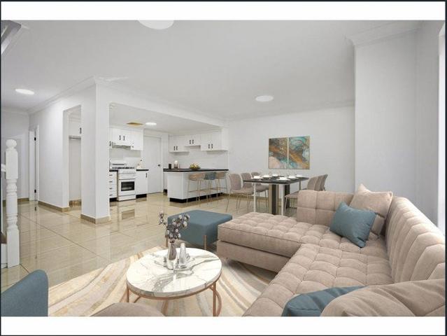 Freshly Updated Three Bedroom Townhouse with Double Garage