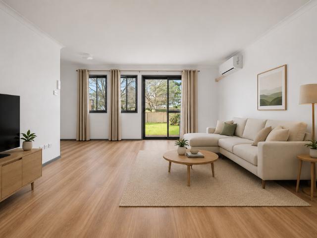 Freshly Updated Three Bedroom Unit with Expansive Backyard