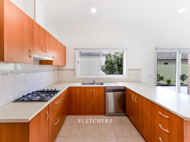Freshly Updated Three Bedroom Unit with Spacious Courtyard