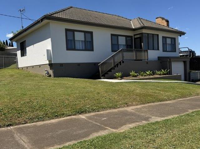 Freshly Updated Three Bedroom Home with a Huge Fully Fenced Backyard