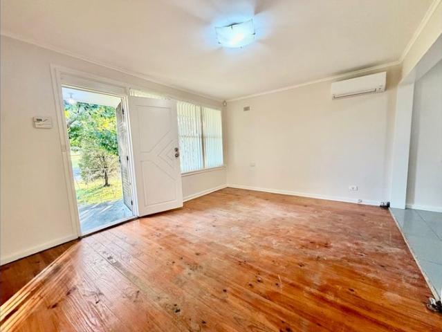 FRESHLY UPDATED THREE BEDROOM HOME