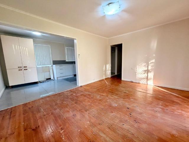 FRESHLY UPDATED THREE BEDROOM HOME