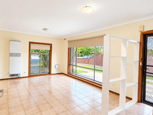 FRESHLY UPDATED THREE BEDROOM HOME
