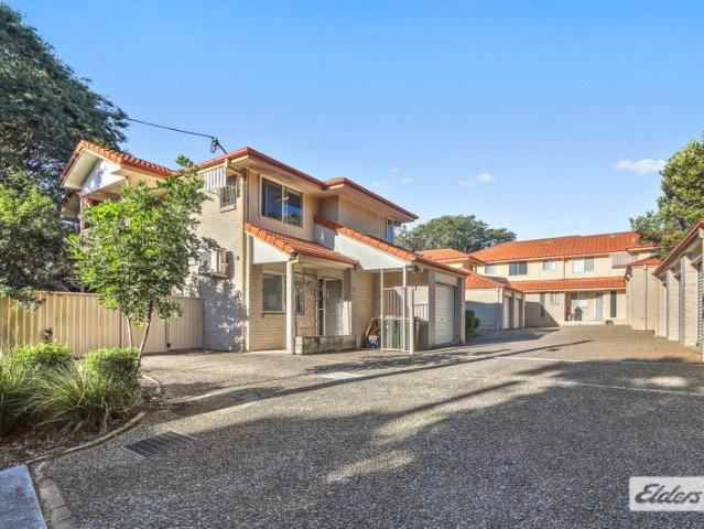 Freshly Updated Two Level Townhouse with a Generous Private Courtyard