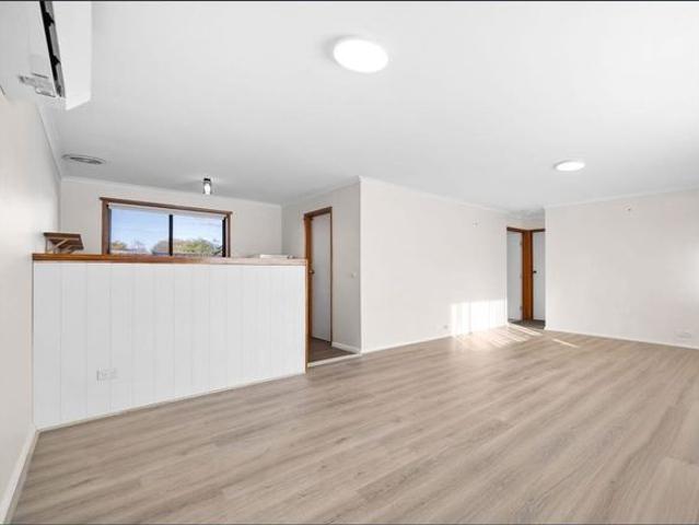 Freshly Updated Unit with Modern Kitchen, Solar & Spacious Backyard