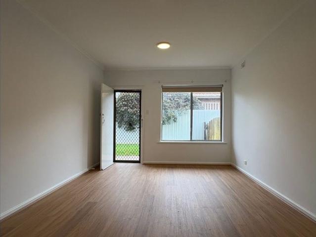 Freshly Updated Unit in Sought After Location