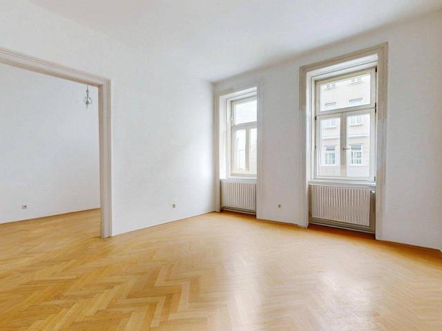 Frisch modernisiert am Grünen Prater: 2 Zimmer, Fischgrätparkett, Holzofen