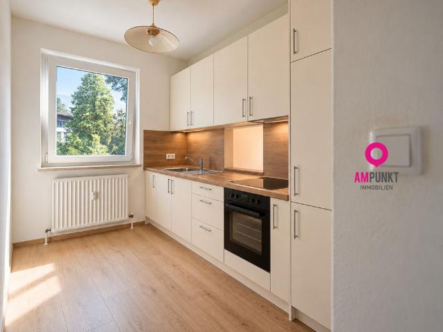Frisch renoviert in Aigen: 3 Zimmer und eine Loggia mitten im Grün