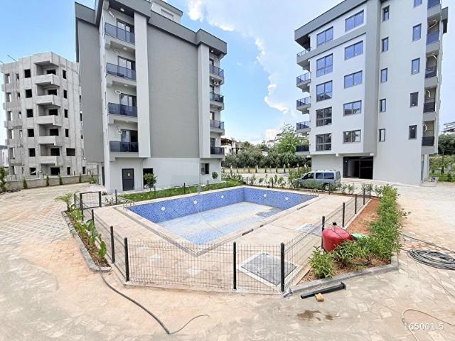 FU'DAN KUYULUK'DA MARKA PROJE'DE HAVUZLU 2+1 DAİRE