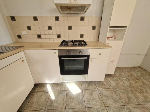 Full of Character 2 bedroom Plus 3rd room or study Town House at the back of the Shop