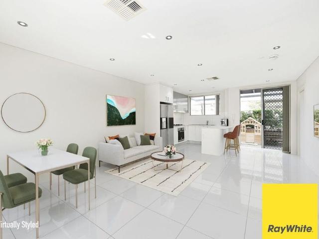 FULL BRICK | NORTH ASPECT Towehouse in prime location!