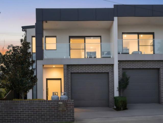 Full Brick Duplex Offering Modern Family Living Must Be Sold!