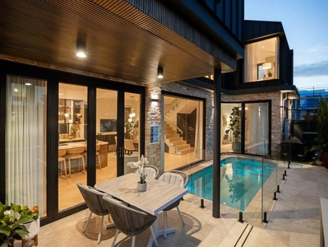 Full brick family oasis of architectural design and craftsmanship