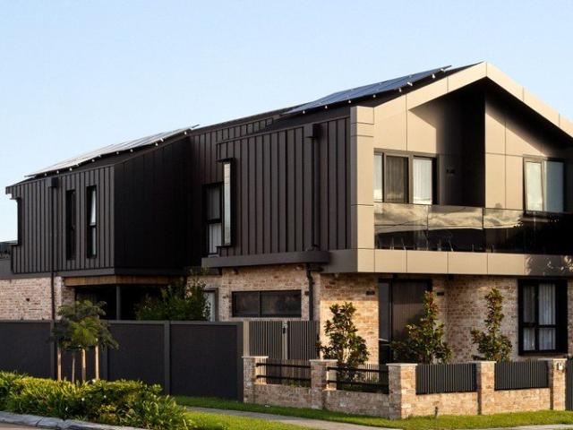 Full brick family oasis of architectural design and craftsmanship
