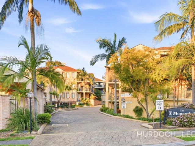 Full brick Ground Floor Apartment with Double Garage & Resort Style Living!