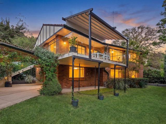 Full brick home creates hidden treetop retreat