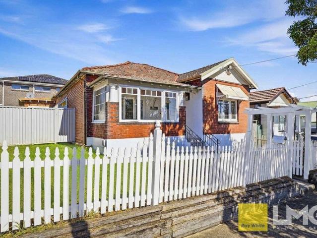 FULL BRICK HOME ON CORNER BLOCK