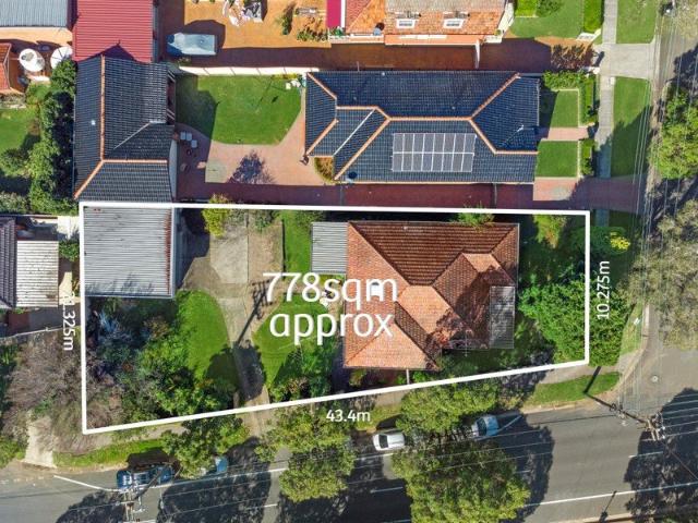 Full Brick Home on Extensive Corner Block with Approved Plans for Two Free Standing Luxury Homes
