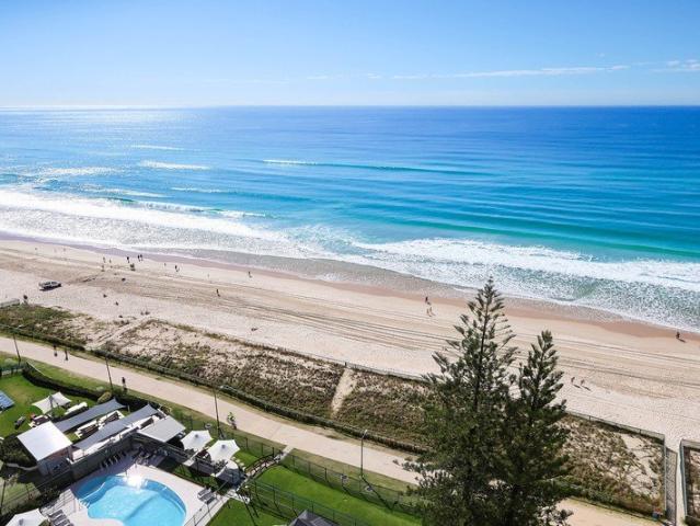 Full Floor Absolute Beachfront Sky Home with Sweeping Ocean to Hinterland Views