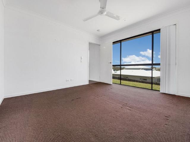 FULLY AIR CONDITIONED HILLTOP SPLIT LEVEL HOME
