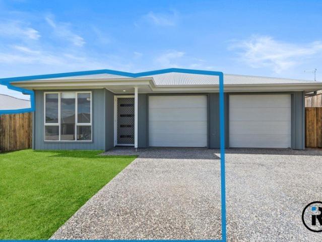 Fully Fenced Duplex with Air Conditioning Your Dream Home Awaits!