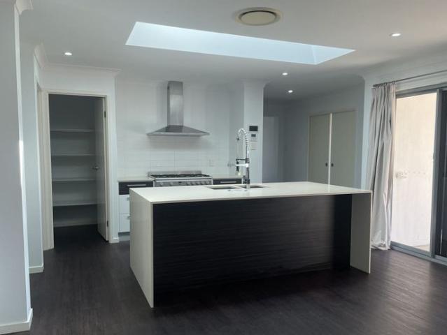 FULLY FENCED MODERN HOME IN AN IDEAL LOCATION