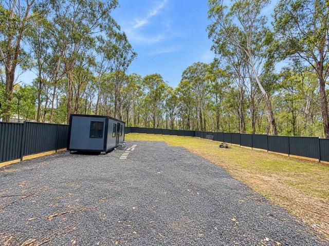 Fully Fenced Yard with No Trees Endless Opportunities