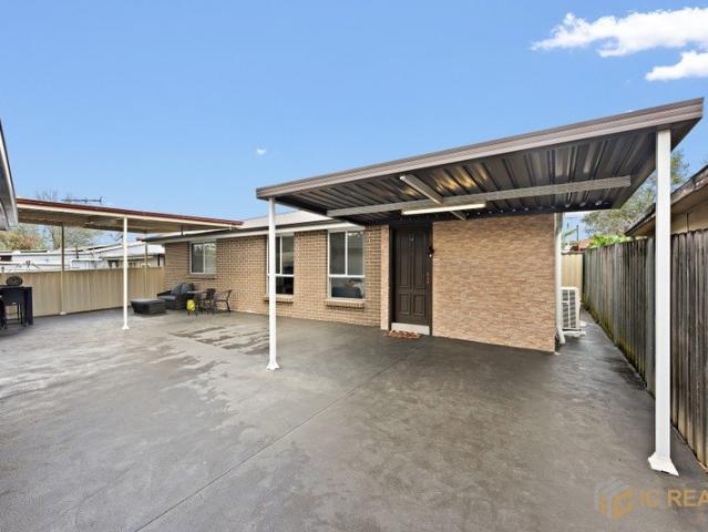 Fully Furnished 3 Bedroom Home with Private Yard & Covered Parking