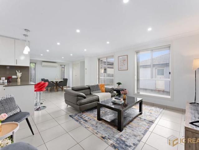 Fully Furnished 3 Bedroom Home with Private Yard & Covered Parking