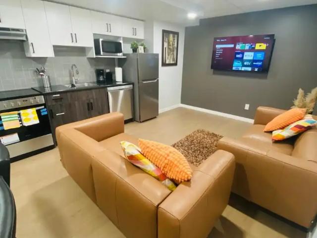 Fully Furnished 2 Bedrooms with High Ceiling Basement Suite