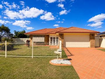 Fully Furnished 4 Bedroom Home with Spacious Living & Convenient Location