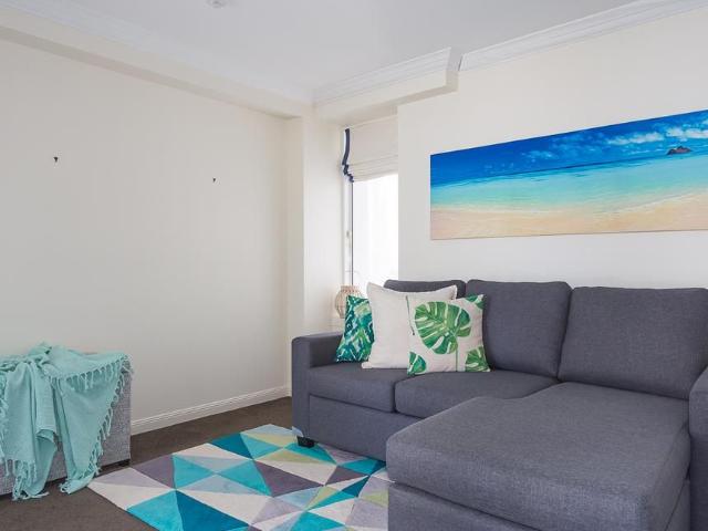 Fully Furnished 8th Floor Corner Apartment