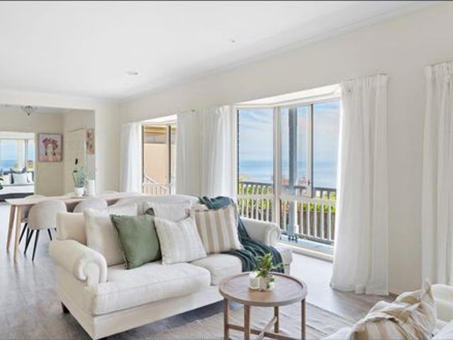 Fully Furnished Coastal Retreat with Breathtaking Bay Views
