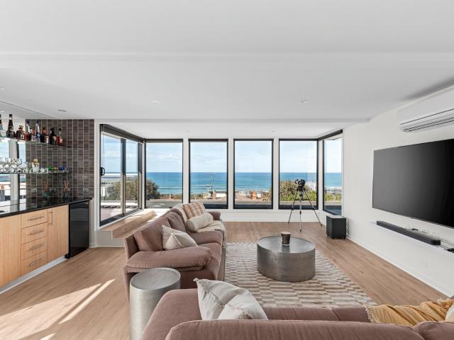 Fully Furnished Coastal Retreat with Sweeping Ocean Views