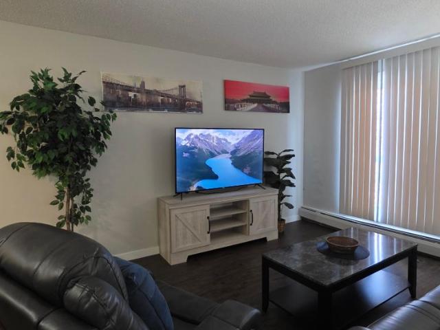 FULLY FURNISHED, ALL UTILITIES, WIFI, PARKING INCLUDED! Great hotel alternative – get more and pay less with all the comforts of home