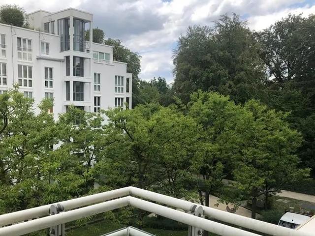 Fully Furnished Apartment with Large Balcony & Green Courtyard Views